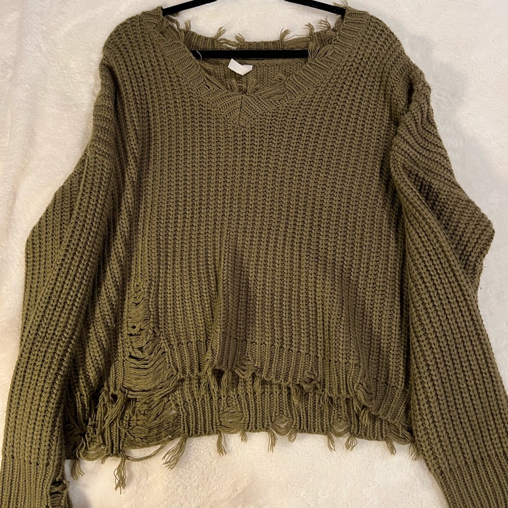 Green distressed sweater